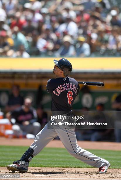 Lonnie Chisenhall of the Cleveland Indians bats against the Oakland Athletics in the second inning at Oakland Alameda Coliseum on June 30, 2018 in...