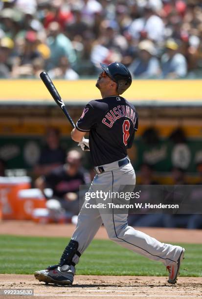 Lonnie Chisenhall of the Cleveland Indians bats against the Oakland Athletics in the second inning at Oakland Alameda Coliseum on June 30, 2018 in...