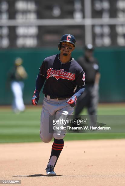 Francisco Lindor of the Cleveland Indians trots around the bases after hitting a solo home run against the Oakland Athletics in the top of the fourth...