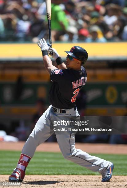 Michael Brantley of the Cleveland Indians bats against the Oakland Athletics in the fourth inning at Oakland Alameda Coliseum on June 30, 2018 in...