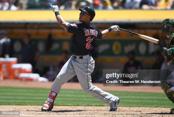 Michael Brantley of the Cleveland Indians bats against the Oakland Athletics in the fourth inning at Oakland Alameda Coliseum on June 30, 2018 in...