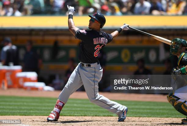 Michael Brantley of the Cleveland Indians bats against the Oakland Athletics in the fourth inning at Oakland Alameda Coliseum on June 30, 2018 in...