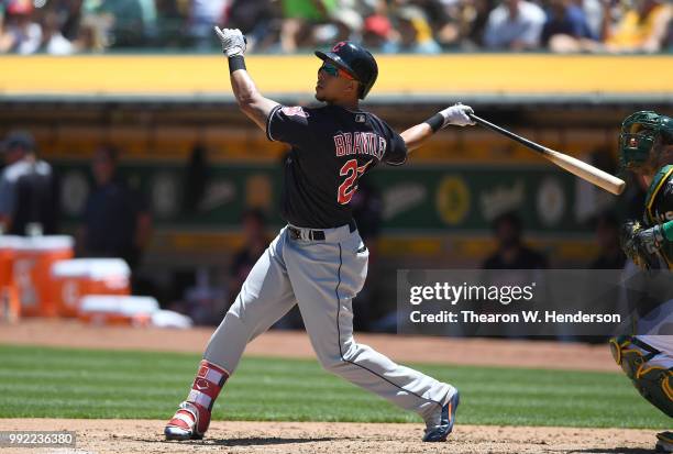 Michael Brantley of the Cleveland Indians bats against the Oakland Athletics in the fourth inning at Oakland Alameda Coliseum on June 30, 2018 in...