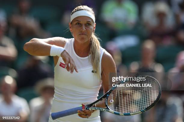 Slovakia's Dominika Cibulkova reacts while playing Britain's Johanna Konta in their women's singles second round match on the fourth day of the 2018...