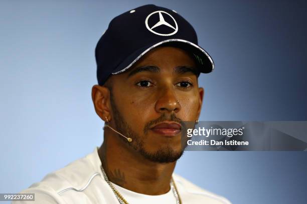 Lewis Hamilton of Great Britain and Mercedes GP talks in the Drivers Press Conference during previews ahead of the Formula One Grand Prix of Great...