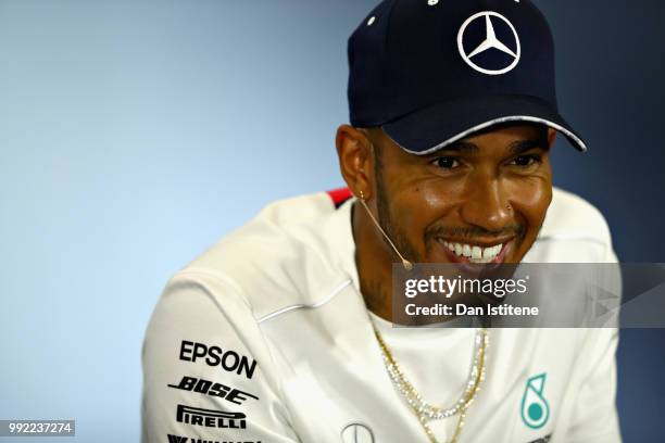 Lewis Hamilton of Great Britain and Mercedes GP talks in the Drivers Press Conference during previews ahead of the Formula One Grand Prix of Great...