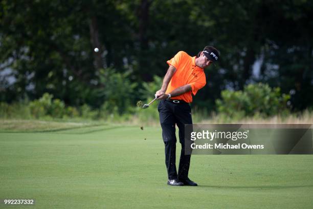 Bubba Watson hits his fourth shot on the 17th hole during round one of A Military Tribute At The Greenbrier at the Old White TPC course on July 5,...
