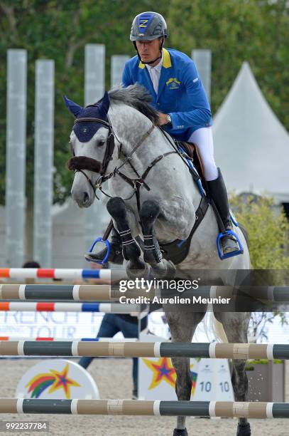 Christian Ahlmann of Germany and Clintrexo Z compete on day 1 of the 5th Longines Paris Eiffel Jumping on July 5, 2018 in Paris, France.