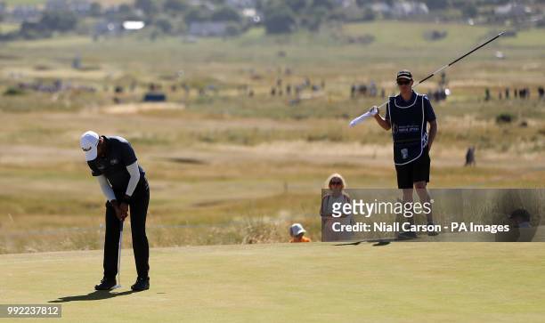 England's Aaron Rai putts on the fourteenth green during day one of the Dubai Duty Free Irish Open at Ballyliffin Golf Club.