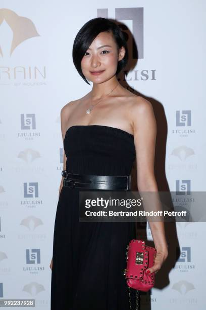 Lin Wang attends the Liu Lisi - Paris Fashion Week - Haute Couture Fall Winter 2018/2019 at Hotel Meurice on July 5, 2018 in Paris, France.