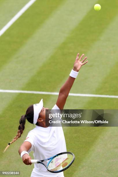 Katie Boulter v Naomi Osaka - Naomi Osaka serves at All England Lawn Tennis and Croquet Club on July 5, 2018 in London, England.