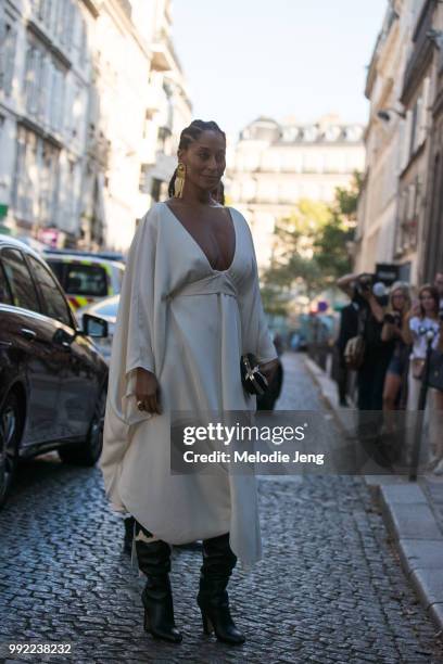 Tracee Ellis Ross outside the Valentino couture show in a white dress on July 4, 2018 in Paris, France.