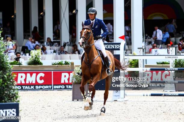 Philippe Rozier riding Reveur de Kergane competes in the Prix Renault ZE at Champ de Mars on July 5, 2018 in Paris, France.