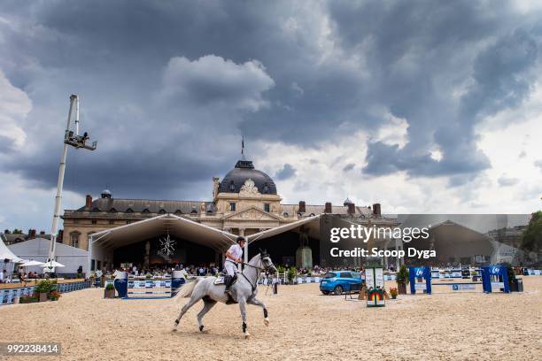 Marcus Ehning riding Cornado NRW competes in the Prix Renault ZE at Champ de Mars on July 5, 2018 in Paris, France.