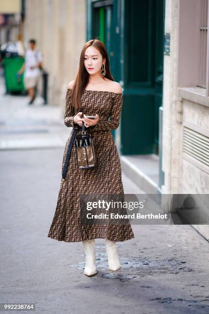 Jessica Jung wears a Fendi brown dress, outside Fendi, during Paris Fashion Week Haute Couture Fall Winter 2018/2019, on July 4, 2018 in Paris,...