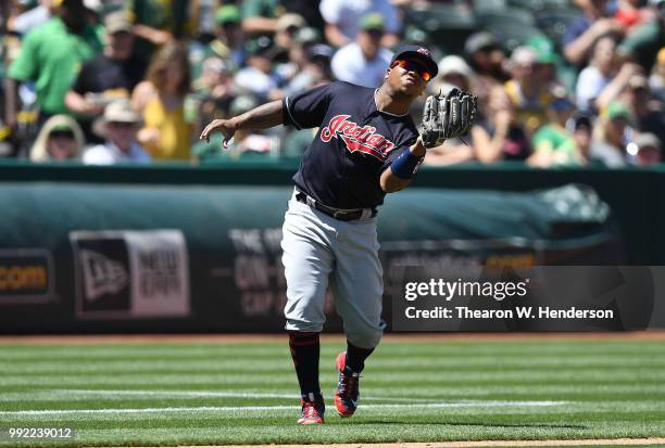 Jose Ramirez of the Cleveland Indians catches a foul pop-up against the Oakland Athletics in the six inning at Oakland Alameda Coliseum on June 30,...