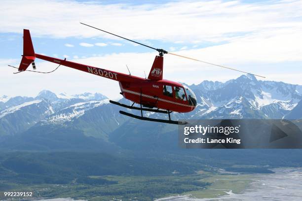 Helicopter departs Mount Marathon during the 91st Running of the Mount Marathon Race on July 4, 2018 in Seward, Alaska. The Mount Marathon Race is...