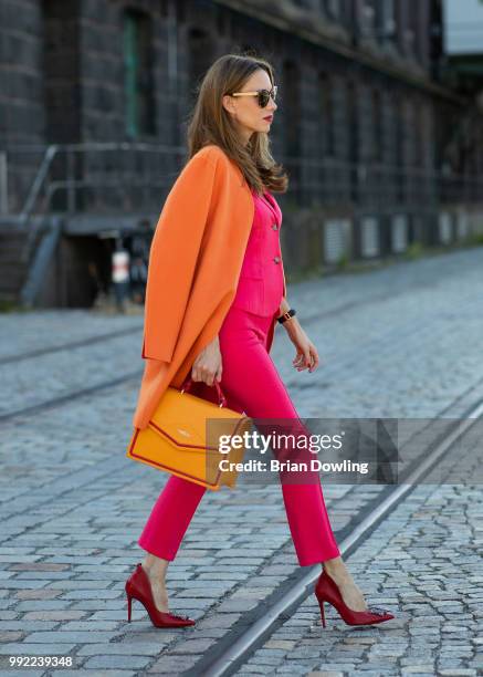 Alexandra Lapp poses during the Marc Cain Street Style shooting at WECC on July 3, 2018 in Berlin, Germany.