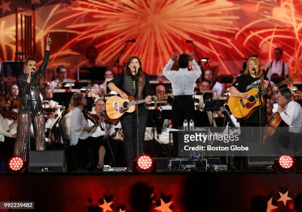 Rachel Platten, left, and the Indigo Girls perform with Boston Pops Orchestra during the Boston Pops July 4th Fireworks Spectacular in Boston on July...