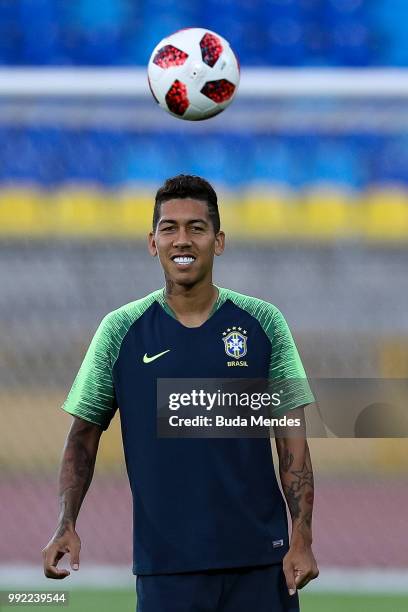 Roberto Firmino in action during a Brazil training session ahead of the the 2018 FIFA World Cup Russia Quarter Final match between Brazil and Belgium...