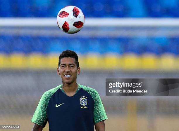 Roberto Firmino in action during a Brazil training session ahead of the the 2018 FIFA World Cup Russia Quarter Final match between Brazil and Belgium...