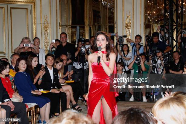 Singer performs during the Liu Lisi - Paris Fashion Week - Haute Couture Fall Winter 2018/2019 at Hotel Meurice on July 5, 2018 in Paris, France.