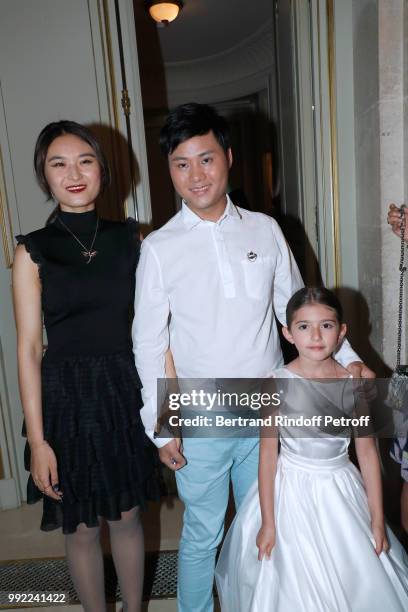 Stylist Liu Lisi poses with Lin Wang after the Liu Lisi - Paris Fashion Week - Haute Couture Fall Winter 2018/2019 at Hotel Meurice on July 5, 2018...