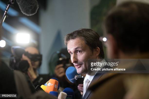 Norbert Scharf, lawyer of the former drugstore owner Anton Schlecker, gives a statement in front of the courtroom of the regional court in Stuttgart,...