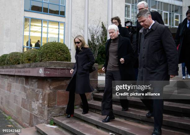 The former drugstore owner Anton Schlecker and his daughter Meike Schlecker leave the regional court after the verdict in Stuttgart, Germany, 27...