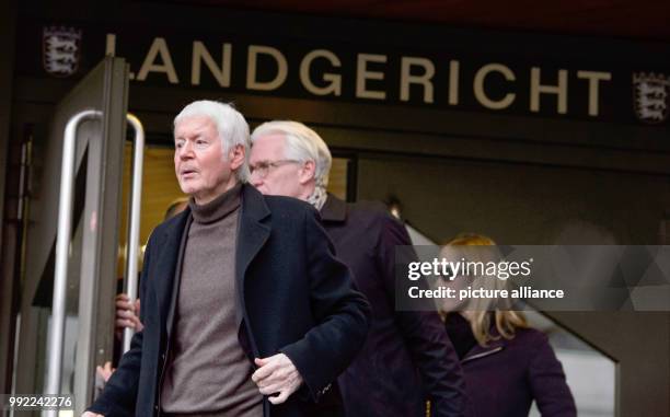 The former drugstore owner Anton Schlecker and his daughter Meike Schlecker leave the regional court after the verdict in Stuttgart, Germany, 27...