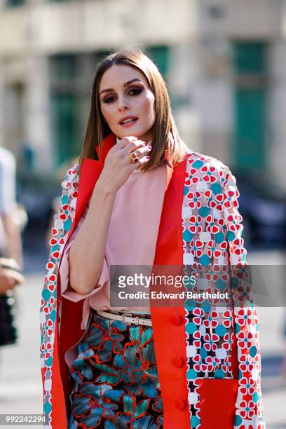 Olivia Palermo wears a flower print kimono jacket, a pink top, a skirt , outside Fendi, during Paris Fashion Week Haute Couture Fall Winter...