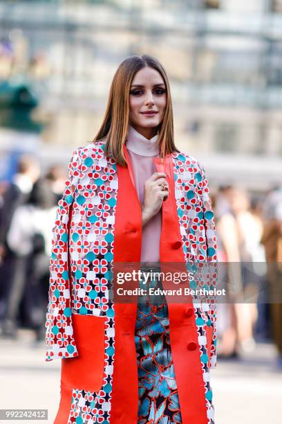 Olivia Palermo wears a flower print kimono jacket, a pink top, a skirt , outside Fendi, during Paris Fashion Week Haute Couture Fall Winter...