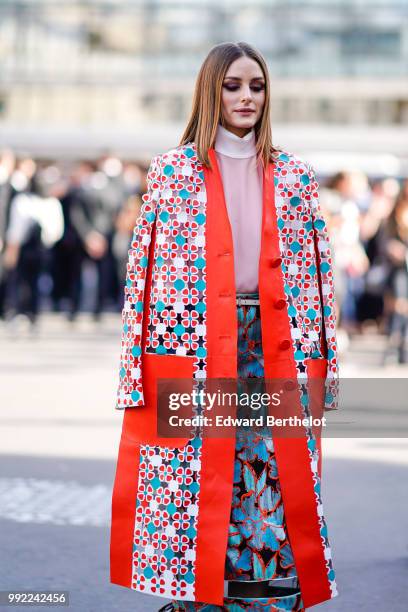 Olivia Palermo wears a flower print kimono jacket, a pink top, a skirt , outside Fendi, during Paris Fashion Week Haute Couture Fall Winter...