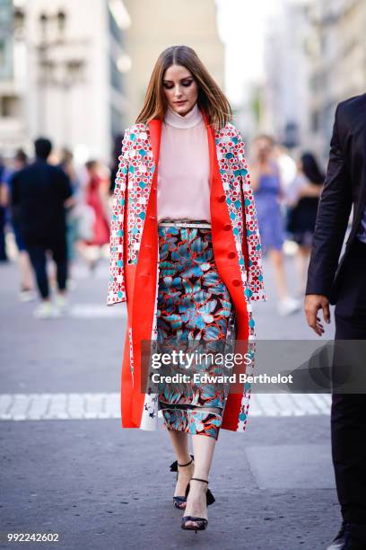 Olivia Palermo wears a flower print kimono jacket, a pink top, a skirt , outside Fendi, during Paris Fashion Week Haute Couture Fall Winter...