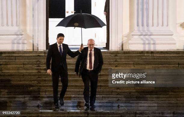 Volker Kauder, parliamentary group leader of the ruling CDU/CSU faction in the German Bundestag , leaves after a meeting with German President...