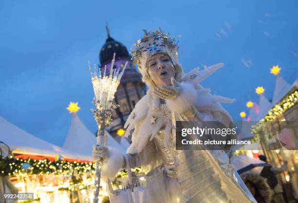 The snow queen greets visitors at the Gendarmen Christmas market in Berlin, Germany, 27 November 2017. The Christmas market at the Konzerthaus in...