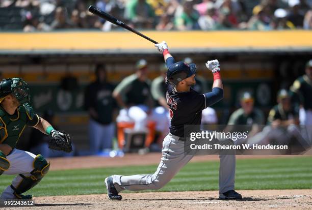 Yan Gomes of the Cleveland Indians bats against the Oakland Athletics in the eighth inning at Oakland Alameda Coliseum on June 30, 2018 in Oakland,...