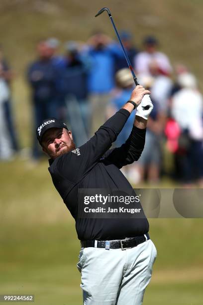 Shane Lowry of Ireland hits his second shot on the 9th hole during day one of the Dubai Duty Free Irish Open at Ballyliffin Golf Club on July 5, 2018...