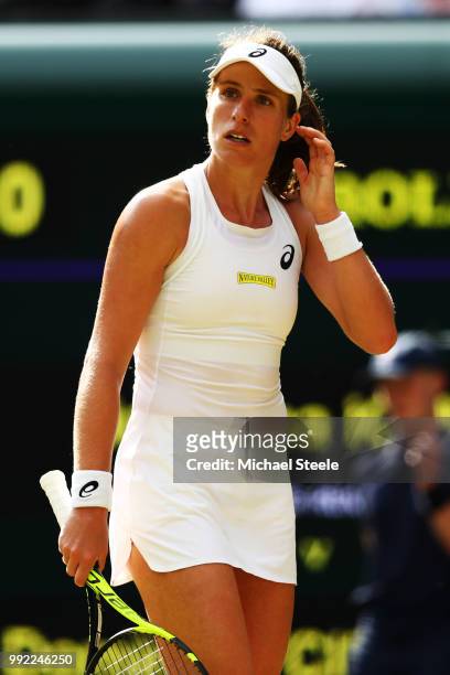 Johanna Konta of Great Britain reacts against Dominika Cibulkova of Slovakia during their Ladies' Singles second round match on day four of the...