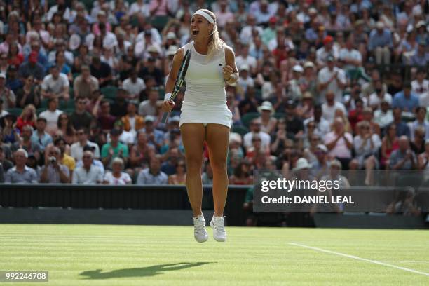 Slovakia's Dominika Cibulkova celebrates after beating Britain's Johanna Konta 6-3, 6-4 in their women's singles second round match on the fourth day...