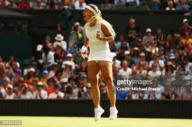 Dominika Cibulkova of Slovakia celebrates after defeating Johanna Konta of Great Britain in their Ladies' Singles second round match on day four of...