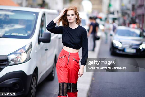 Model Alexina Graham wears a black top, outside Jean-Paul Gaultier, during Paris Fashion Week Haute Couture Fall Winter 2018/2019, on July 4, 2018 in...