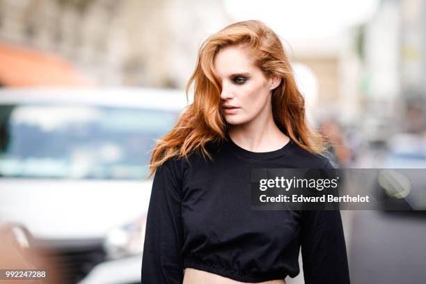 Model Alexina Graham wears a black top, outside Jean-Paul Gaultier, during Paris Fashion Week Haute Couture Fall Winter 2018/2019, on July 4, 2018 in...