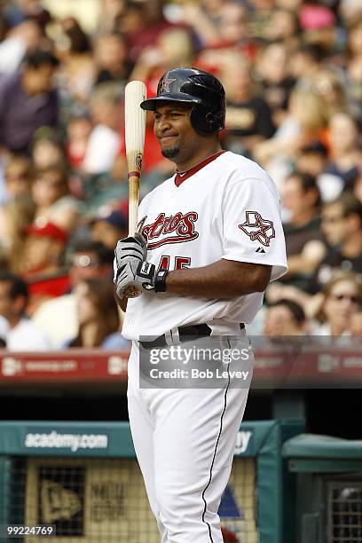 Carlos Lee of the Houston Astros bats during a baseball game between the San Diego Padres and Houston Astros at Minute Maid Park on May 8, 2010 in...