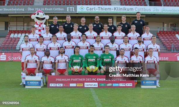 Back row L-R Mascot Lauzi, team leader Andre Rohbock, physiotherapist Oliver Krautz, assistant coach Frank Eulberg, head coach Claus Dieter Wollitz,...