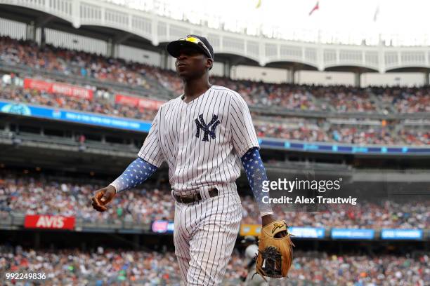 Didi Gregorius of the New York Yankees walks back to the dugout during a game against the Atlanta Braves at Yankee Stadium on Wednesday, July 4, 2018...
