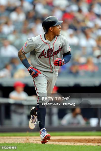 Johan Camargo of the Atlanta Braves rounds the bases after hitting a solo home run during a game against the New York Yankees at Yankee Stadium on...