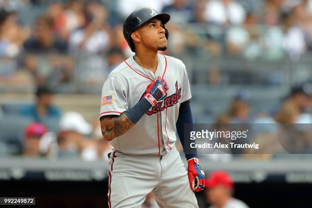 Johan Camargo of the Atlanta Braves reacts after hitting a solo home run during a game against the New York Yankees at Yankee Stadium on Wednesday,...