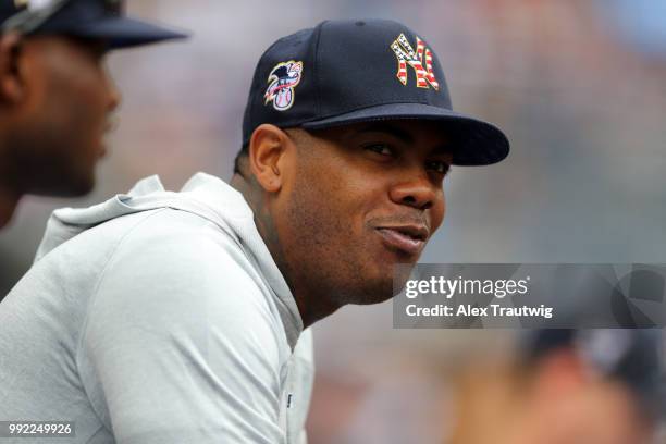 Aroldis Chapman of the New York Yankees looks on from the dugout during a game against the Atlanta Braves at Yankee Stadium on Wednesday, July 4,...