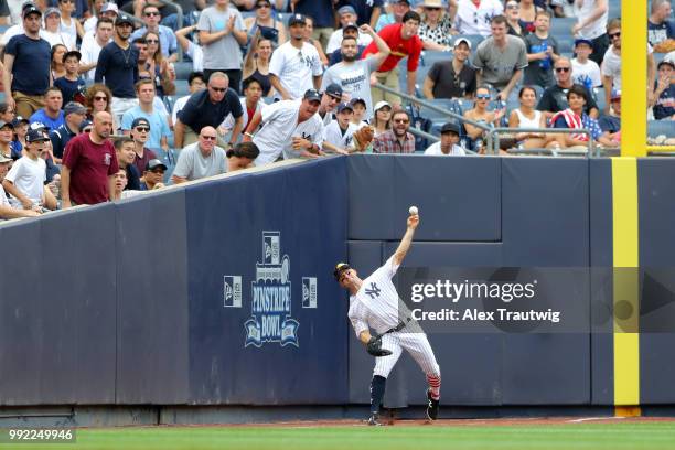 Brett Gardner of the New York Yankees throws during a game against the Atlanta Braves at Yankee Stadium on Wednesday, July 4, 2018 in the Bronx...